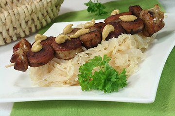 Image showing Sauerkraut with sausages