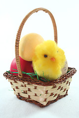 Image showing Easter basket with Easter eggs and chicks