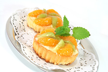 Image showing Mandarin tartlet with lemon balm