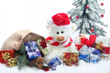 Image showing Teddy with a lot of Christmas presents