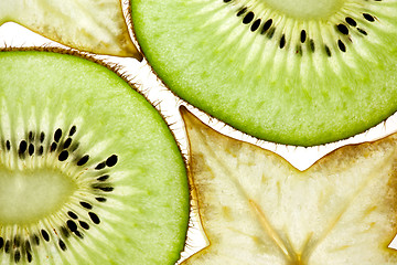 Image showing Sliced Kiwi and Carambola Starfruit isolated on white