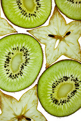 Image showing Sliced Kiwi and Carambola Starfruit isolated on white