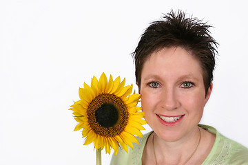 Image showing Woman's face and a sunflower