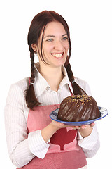 Image showing housewife  with bundt cake