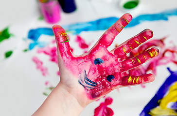 Image showing Little Children Hands doing Fingerpainting