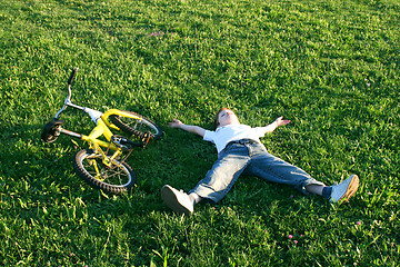 Image showing a break in the garden of a beautiful boy