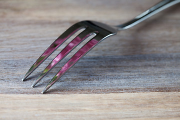 Image showing Steel Fork on wooden Table