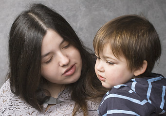 Image showing Mother consoling her child