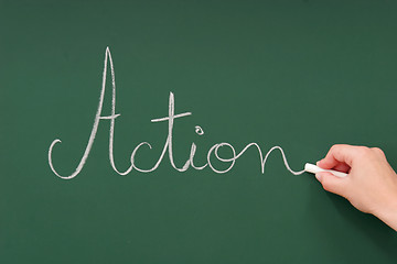 Image showing action written on a blackboard