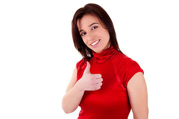 Image showing Young pretty women with thumb raised as a sign of success, thumbs up