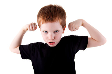 Image showing Portrait of a very happy cute boy with his arms raised