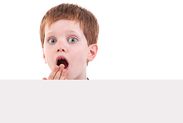 Image showing cute  boy surprised with white board