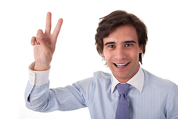 Image showing Young bussiness man with arm raised in victory sign