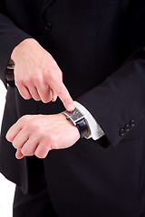 Image showing businessman pointing to the watch