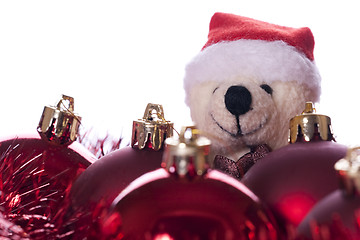 Image showing Christmas: balls, ribbons and teddy bear