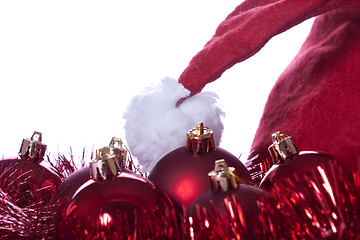 Image showing Balls, bands and Santa Claus hat