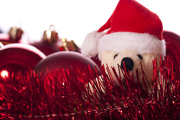 Image showing Christmas: balls, ribbons and teddy bear