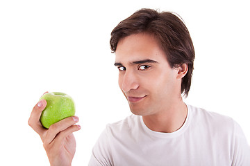 Image showing man eating a green apple