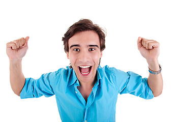 Image showing Portrait of a very happy young man with his arms raised