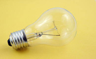 Image showing lightbulb isolated on yellow