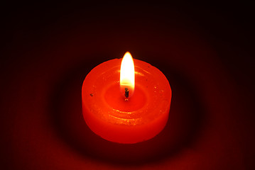 Image showing Candles burning in the dark