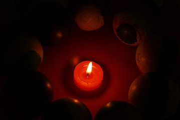 Image showing Candles burning in the dark