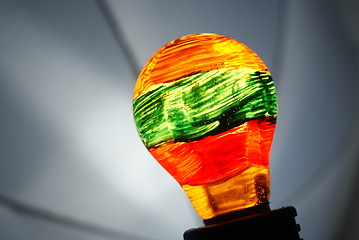 Image showing colorful light bulb isolated