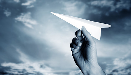 Image showing throwing a paper plane..