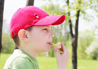 Image showing Boy eating ice-cream