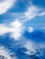 Image showing Blue Clouds Ocean Reflection