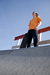 Image showing Skateboarder Standing on a Ramp