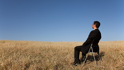 Image showing Businessman waiting at the field