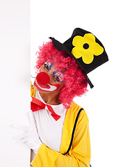 Image showing funny clown holding a banner