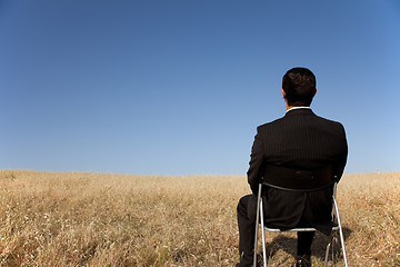 Image showing Businessman waiting at the field