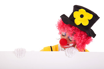 Image showing funny clown holding a banner