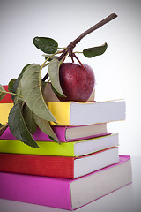 Image showing Books and a fresh apple