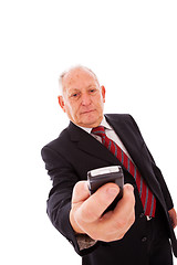 Image showing Senior sending a sms