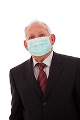 Image showing Older businessman with a mask