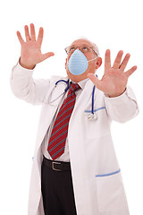 Image showing Senior doctor with a mask