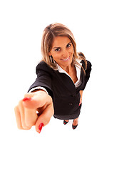 Image showing Happy businesswoman pointing