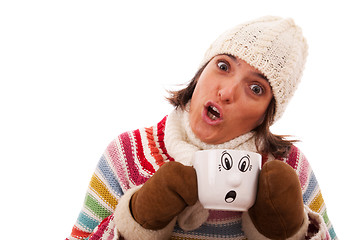 Image showing Surprised woman like her hot drink cup