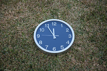Image showing Wall clock in the grass