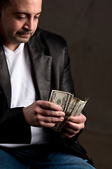 Image showing Man Counting Cash