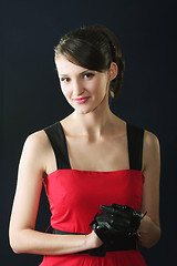 Image showing Brunette in red dress and gloves