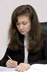 Image showing Businesswoman writing