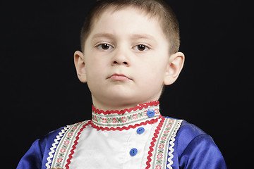 Image showing Serious boy looking from above