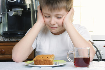 Image showing Boy who likes sweets