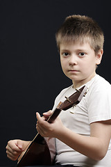 Image showing Kid with balalaika