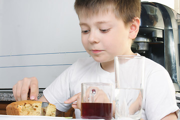 Image showing Boy eating apple pie