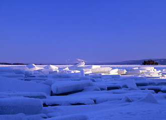 Image showing Ice cubes floating on lake 